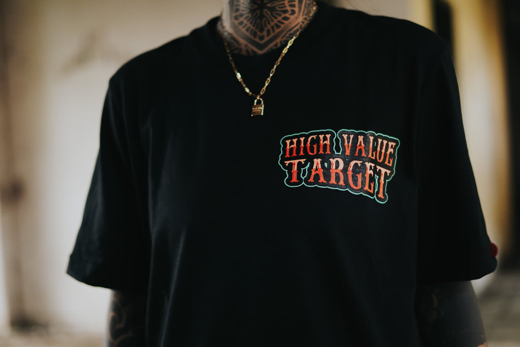 HIGH VALUE TARGET ALL GOODS (BLACK) 100% Cotton T-Shirt