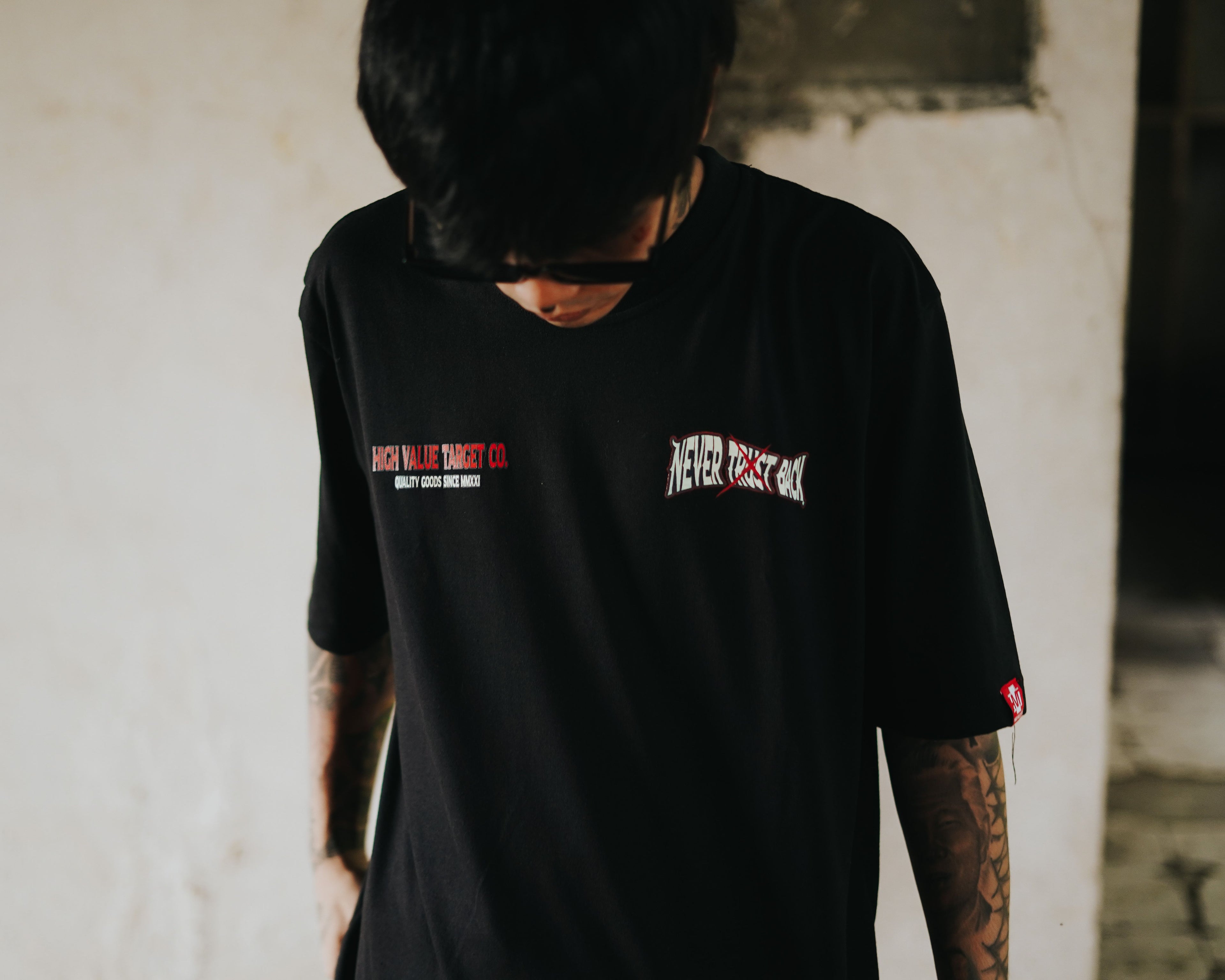 HIGH VALUE TARGET "NEVER TRUST BACK" (Black) CVC Cotton T-Shirt