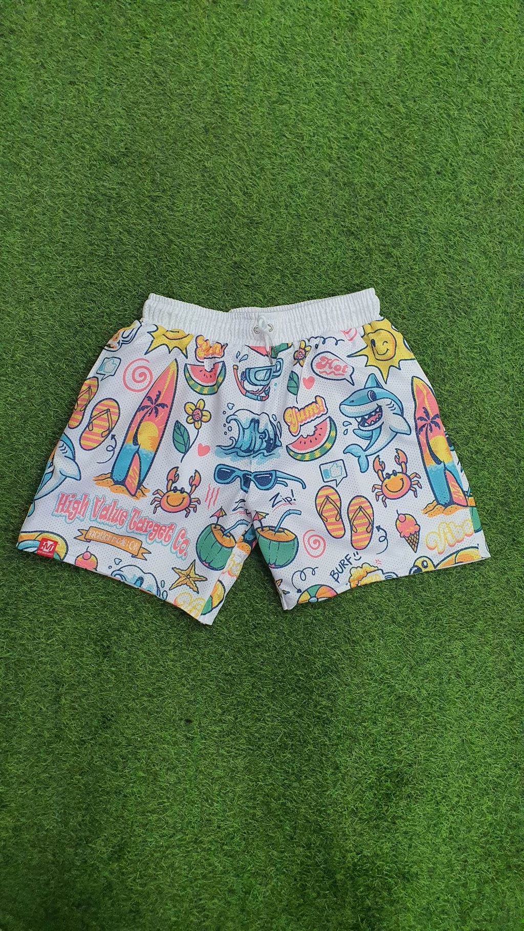 Breathable mesh shorts with Vacation Mode On text and playful travel icons, relaxed summer outfit for casual everyday wear