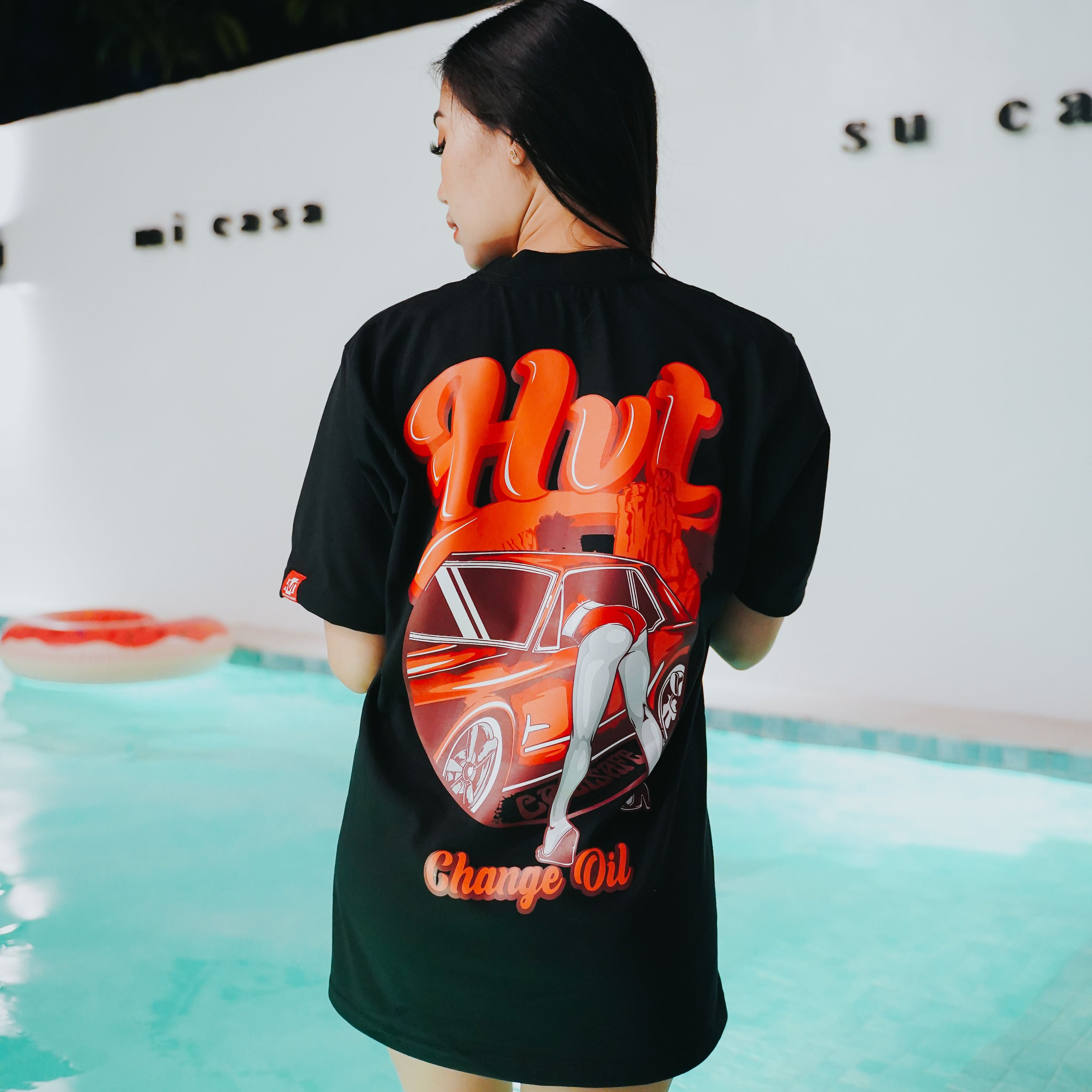 Graphic T shirt with female character and automotive scene for urban fashion use