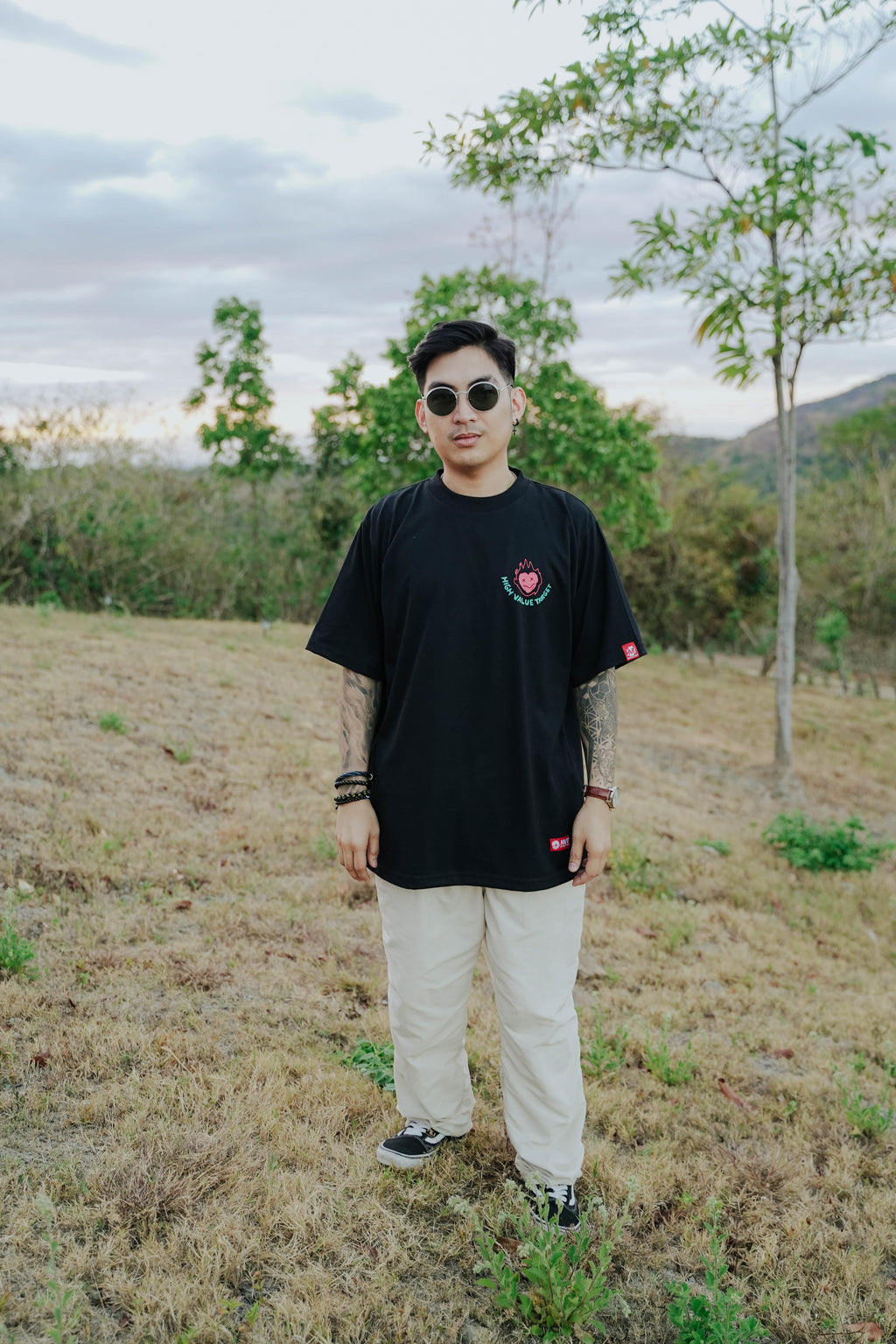 Modern graphic tee with burning heart artwork and High Value Target text, clean yet edgy streetwear front design