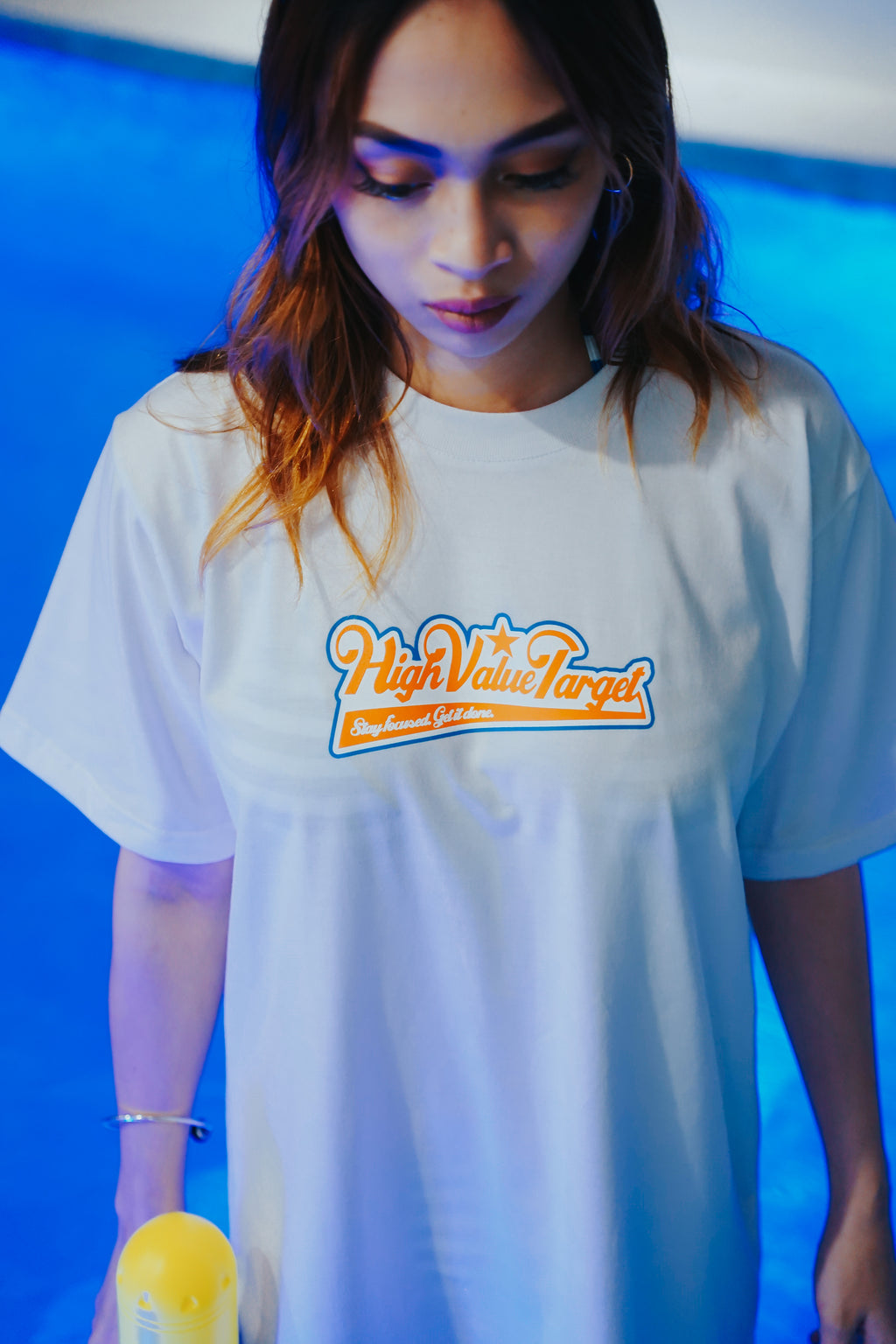White Mixed Logo T shirt with High Value Target text and Stay Focused Get It Done slogan