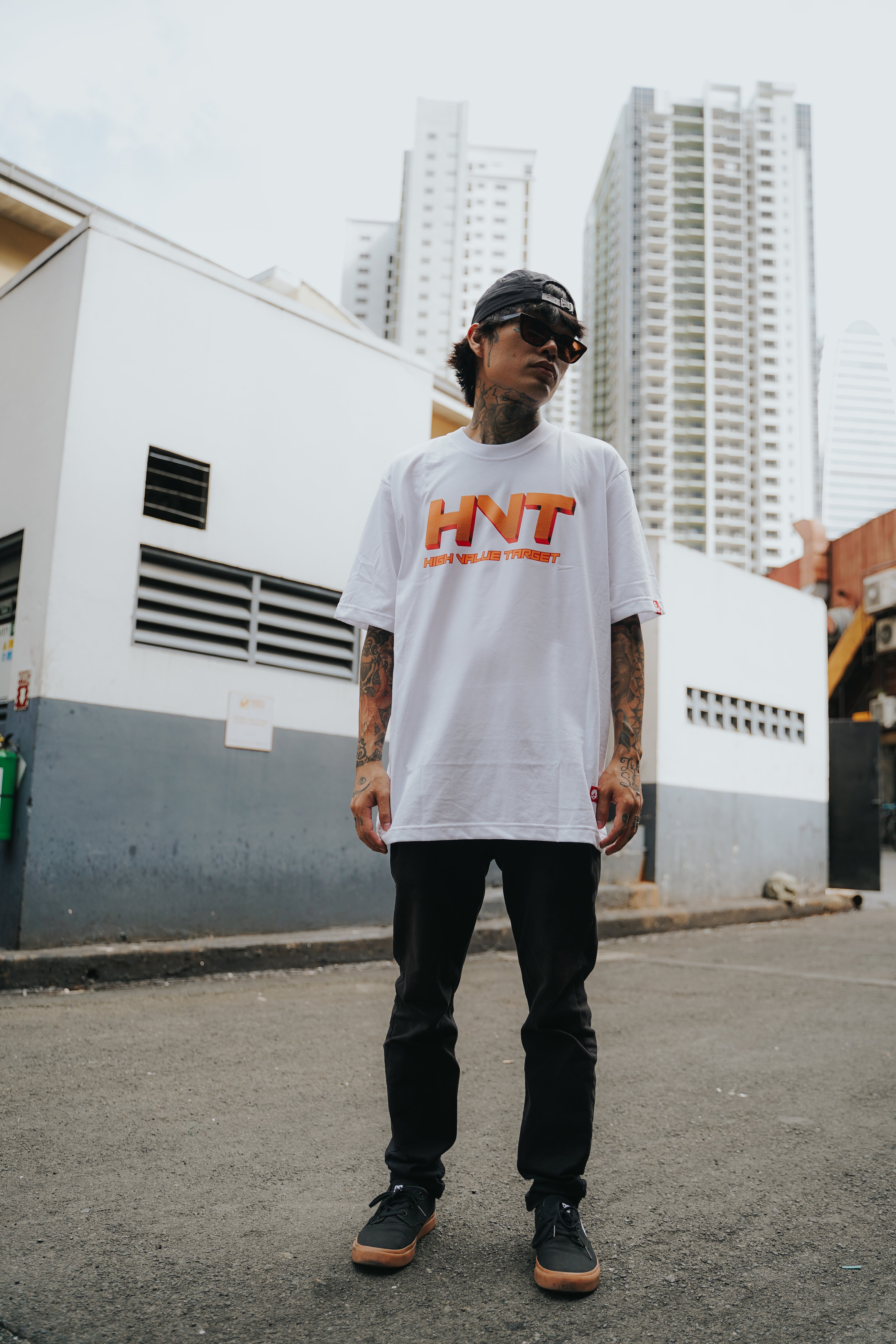 Graphic tee with stylized HVT lettering and clean streetwear typography design