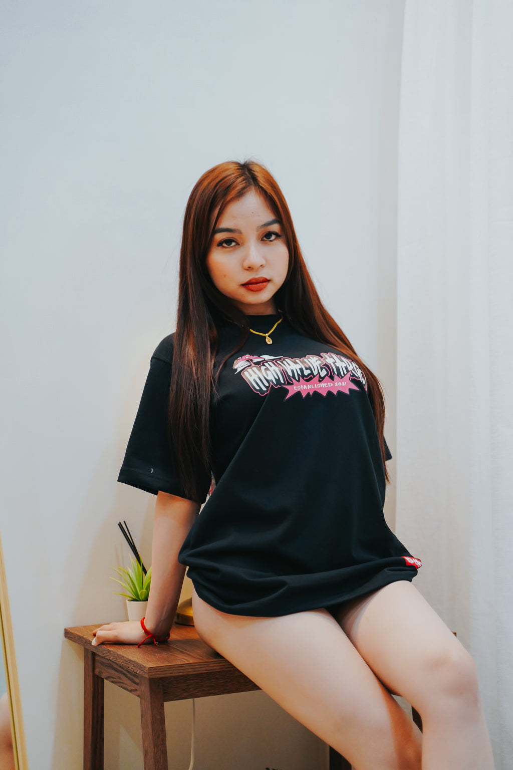 Printed T shirt with stylized lettering design for casual and urban outfit styling