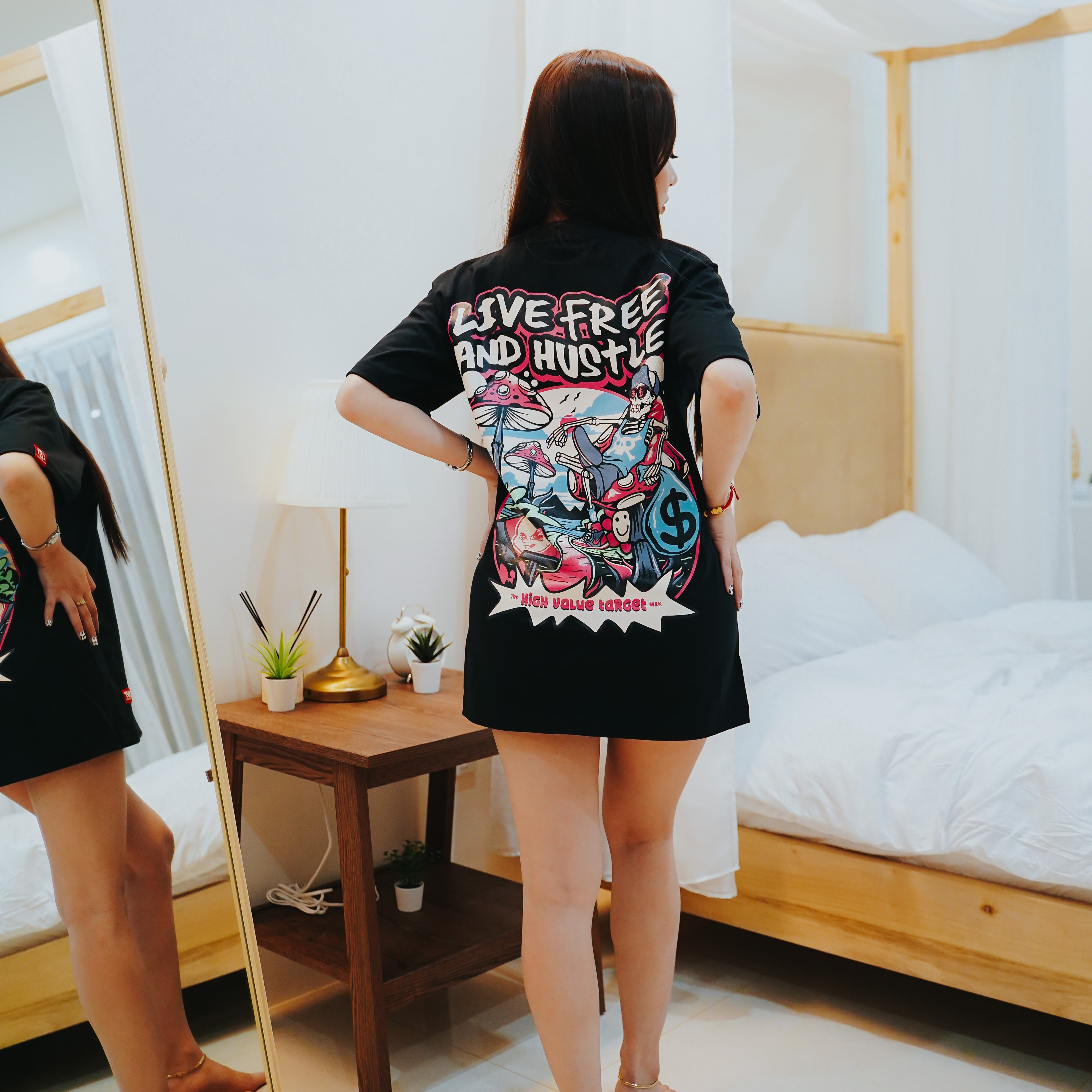 Black streetwear T shirt with Live Free and Hustle theme and bold graphic design