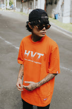 Streetwear T shirt with bold HVT text design for modern casual outfit styling