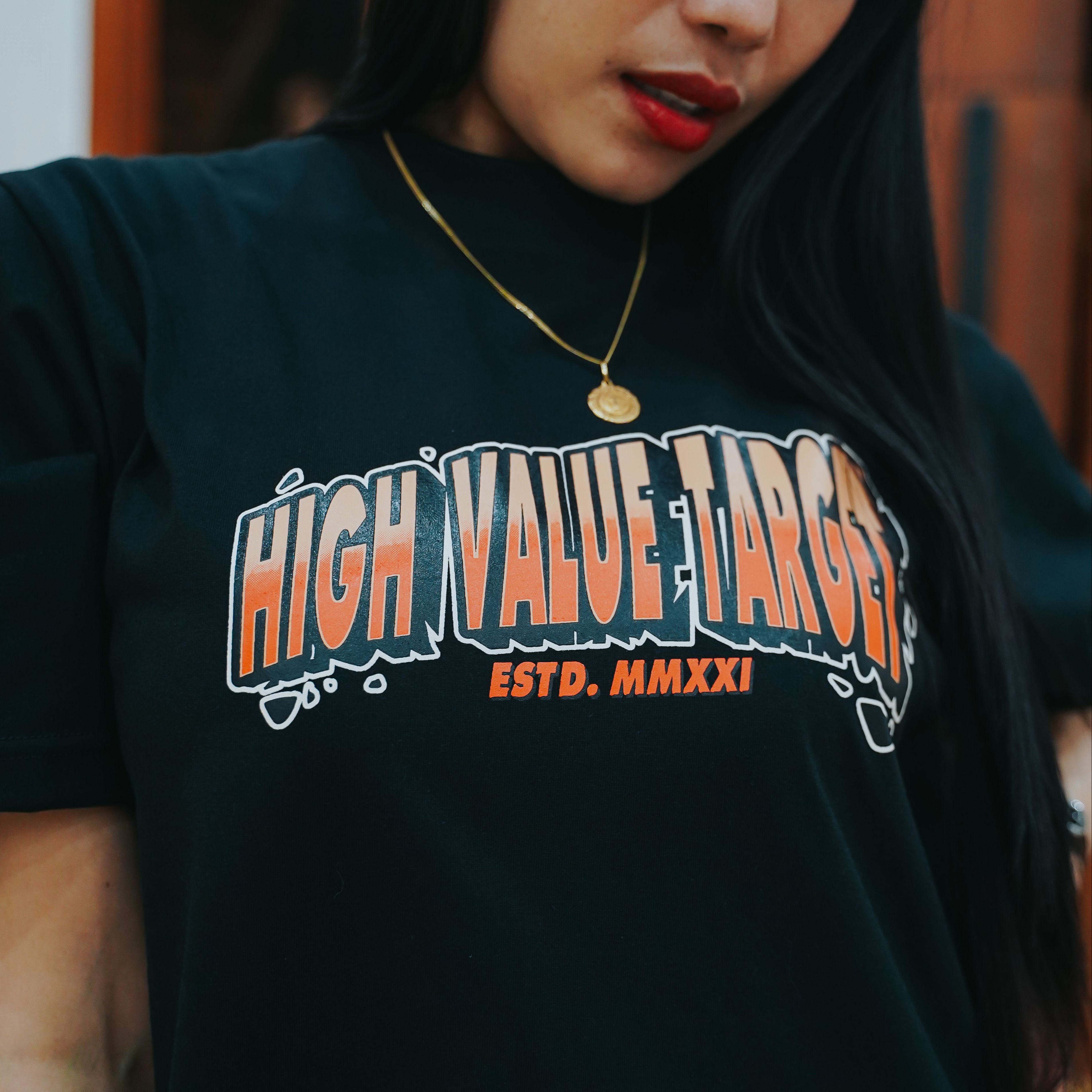 Graphic tee with High Value Target front print and large stylized typography design