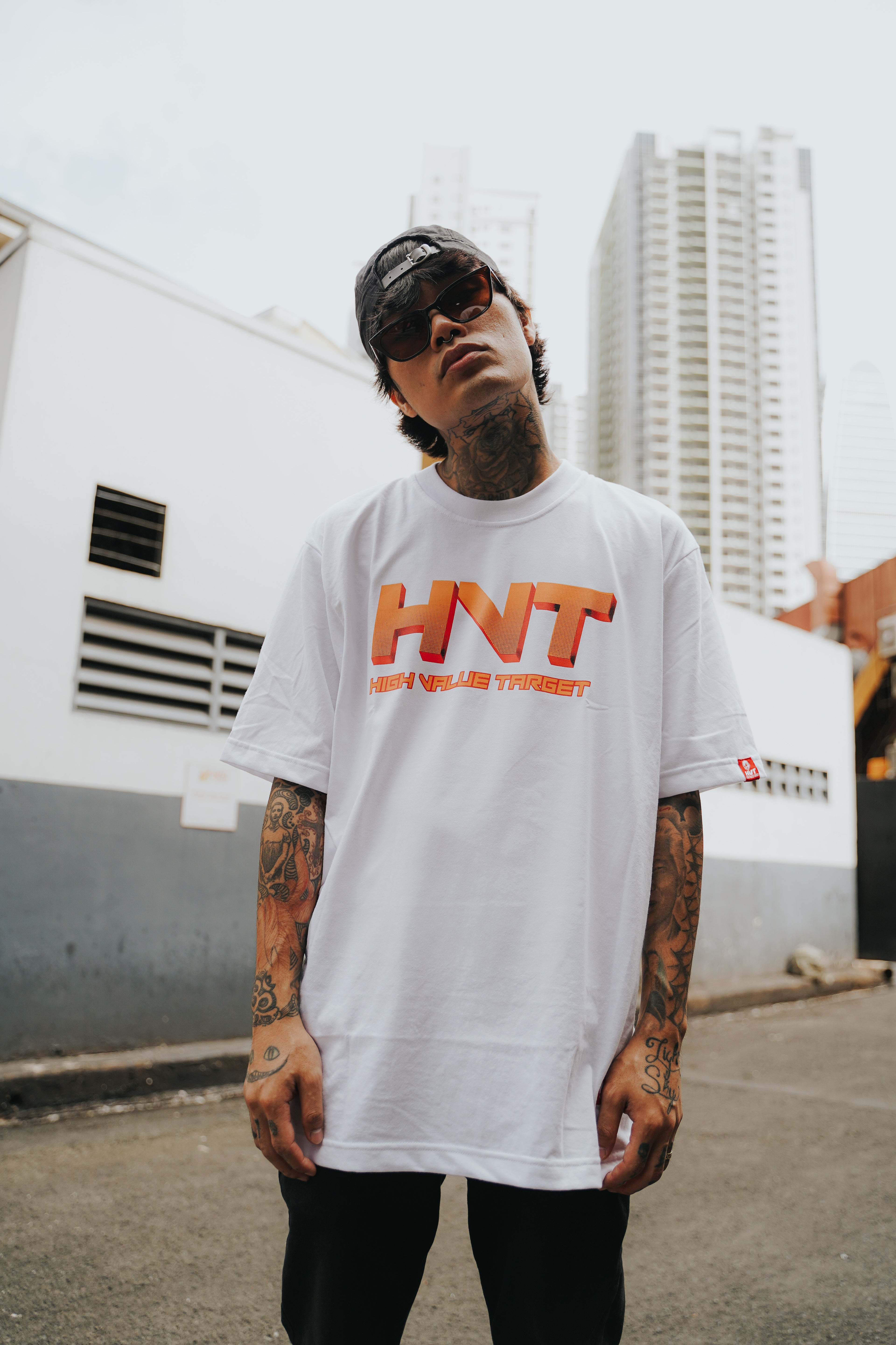 White streetwear T shirt with HVT text design for modern casual outfit styling