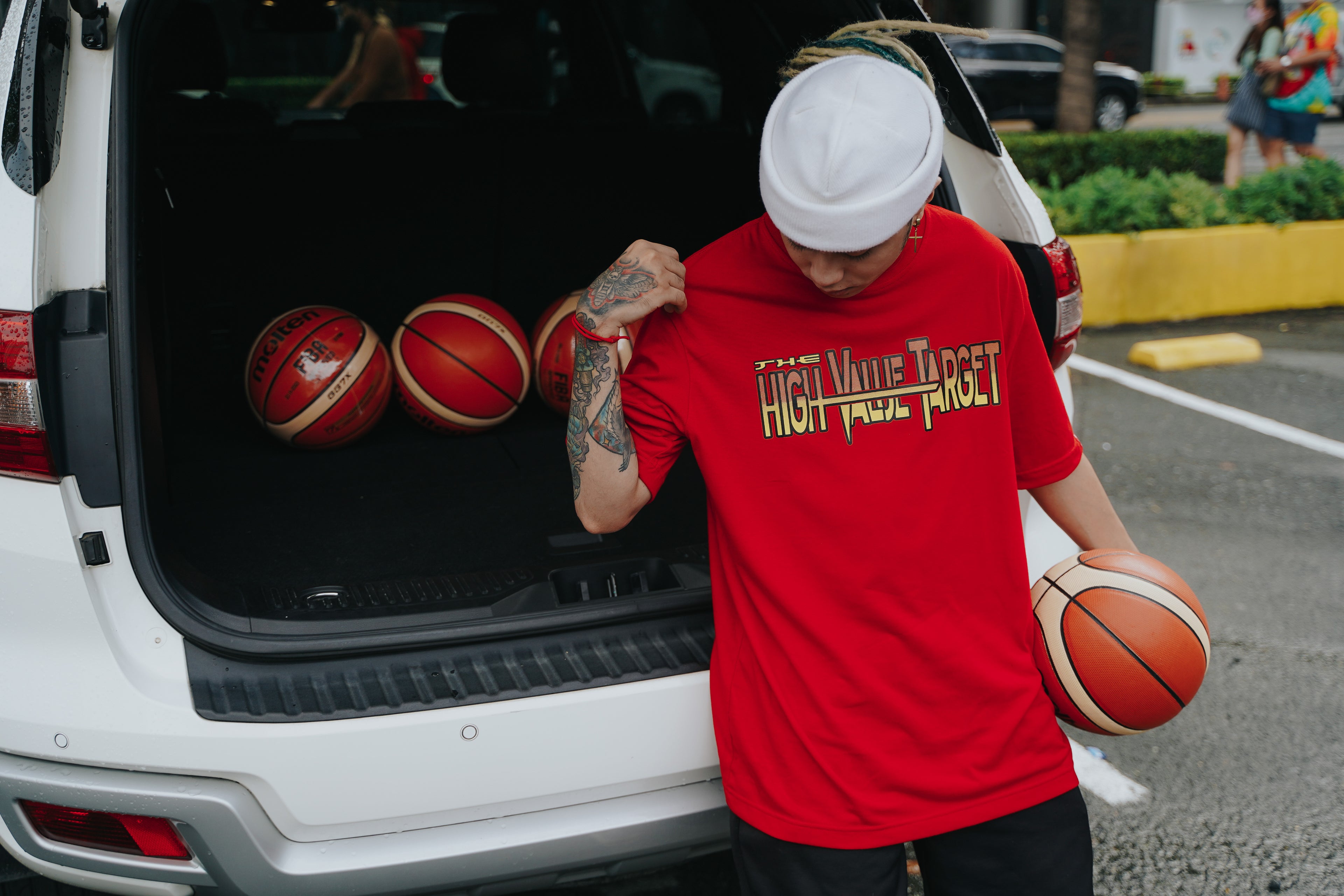 Red printed T shirt with HVT text and strong typography for modern outfit styling