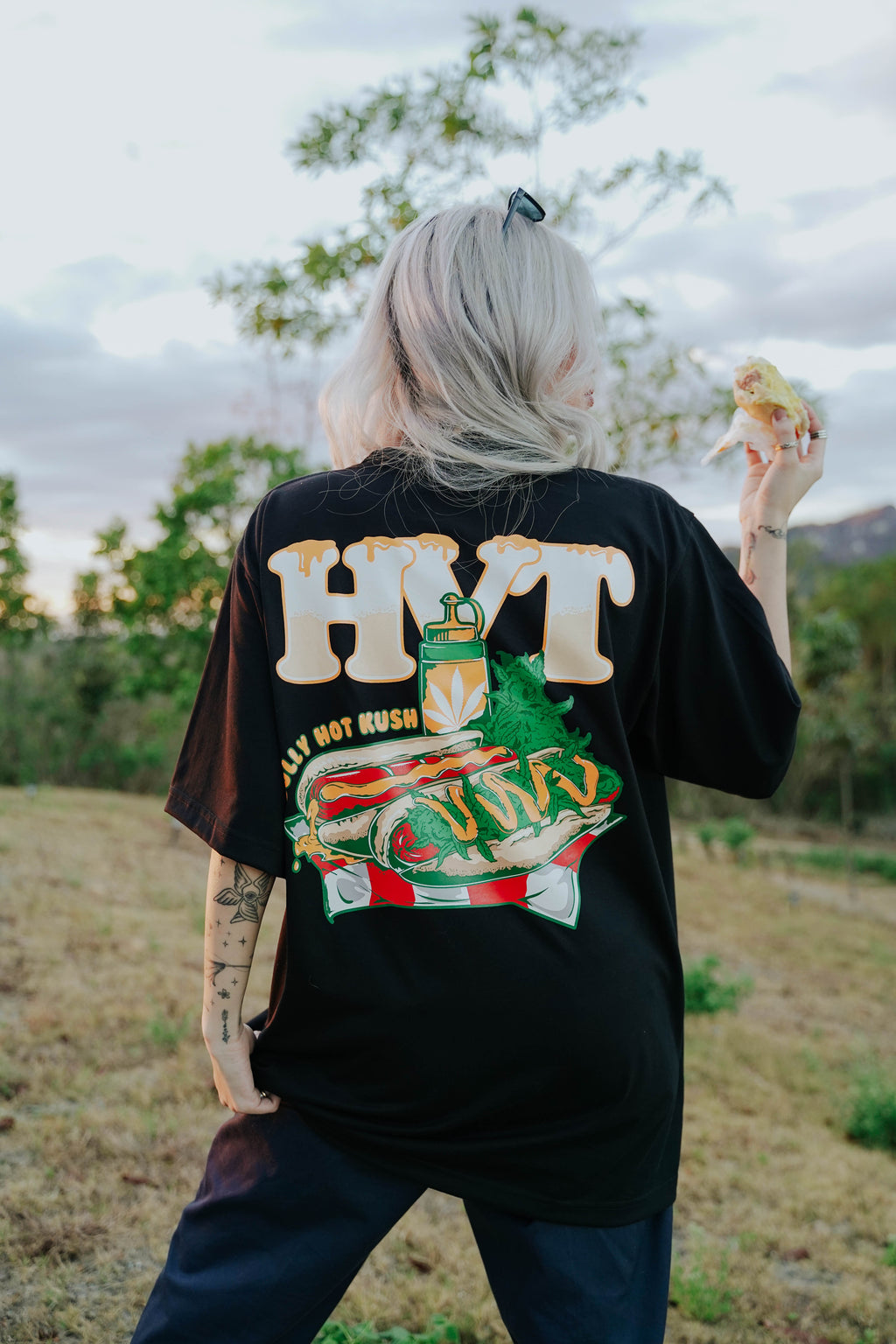 Streetwear T shirt with Jolly Hot Kush theme and bold food style graphic design