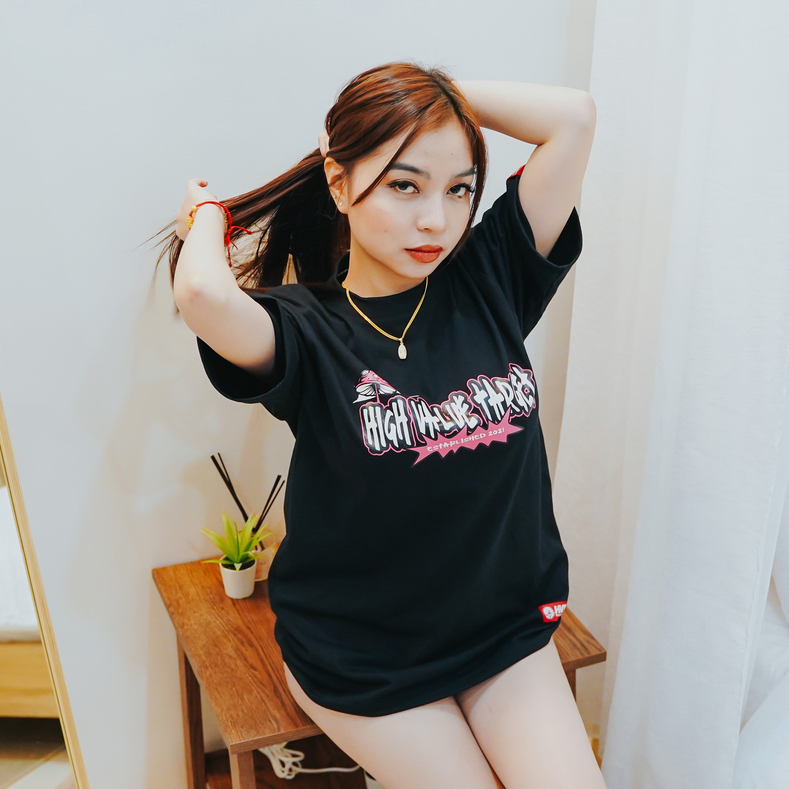 Black streetwear T shirt with graffiti style text design for modern casual outfit styling