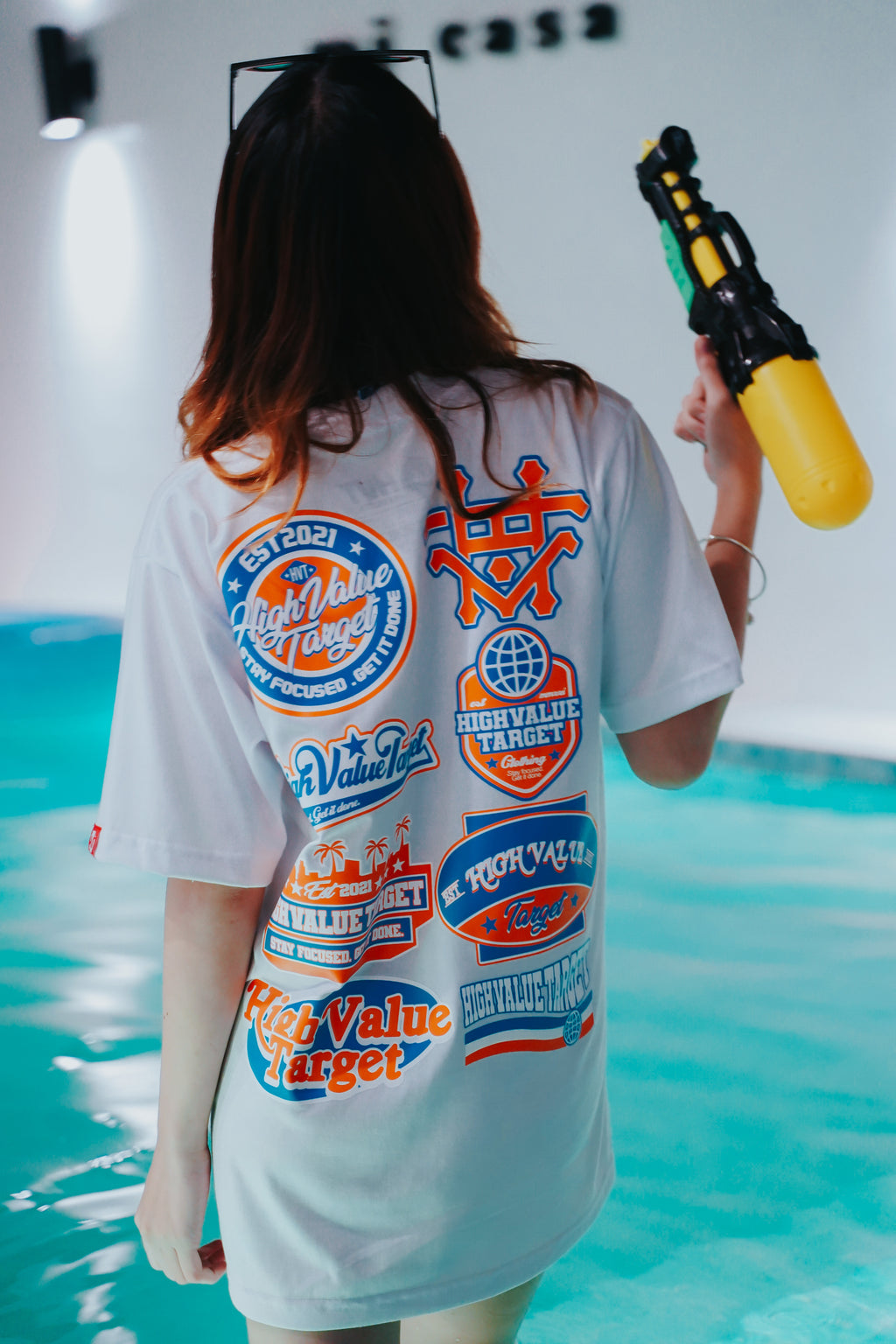 White streetwear T shirt with bold logo text and clean front typography layout