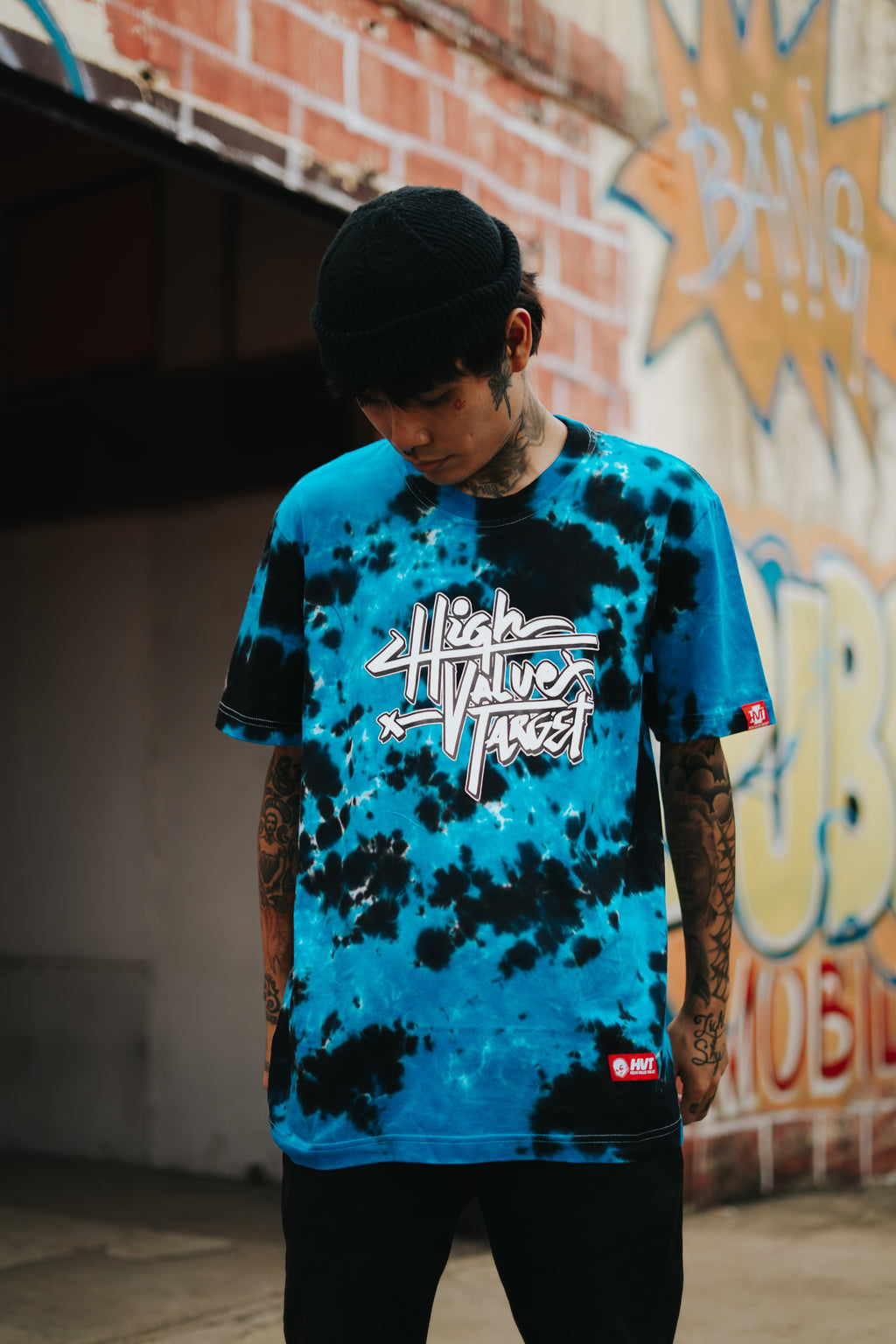 Turquoise tie dye T shirt for relaxed casual wear with unique color blending design